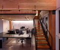 Preview of Architects Office - Image 1: Handrail, Staircase, Lathe, Machine, Flooring, Dining Table, Furniture, Table, Conference Room, Indoors, Meeting Room, Room, meeting space, mezzanine, steel stair, concrete floor, steel table, office, glulam, wood ceiling, Historic.