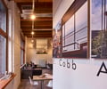 Preview of Architects Office - Image 2: Dining Table, Furniture, Table, Plywood, Wood, Indoors, Interior Design, concrete floor, office, steel table, structure wood, heavy timber, lighting, interior glass, Historic.