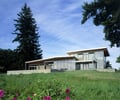 Preview of Bruckner Residence - Image 4: Building, Cottage, House, Housing, roof extension, exterior glass, concrete wall.