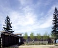 Preview of Bruckner Residence - Image 7: Patio, Porch, Building, Cottage, House, Housing, concrete wall, waterfront, roof extension, courtyard.