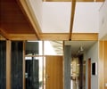 Preview of Bruckner Residence - Image 8: Shelf, Door, Folding Door, Closet, Cupboard, Furniture, structure wood, concrete wall, wood ceiling, wood floor, skylight.