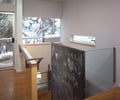 Preview of Cascades Lakehouse - Image 7: Blackboard, Hardwood, Wood, Banister, Handrail, staircase, wood floor, chalkboard.