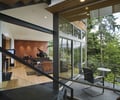 Preview of Dellplain Residence - Image 0: Interior Design, Deck, Wood, Steel, Structure Steel, Couch, Furniture, Great Room, Indoor outdoor, Window, Glass.