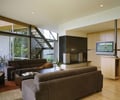Preview of Dellplain Residence - Image 2: Couch, Furniture, Building, Indoors, Interior Design, Room, Living Room, Television, Glass, Window, Staircase, Steel, Wood, Great Room.