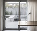 Preview of Denny Blaine Courtyard and Remodel - Image 11: desk, curtain.