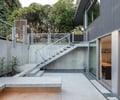 Preview of Denny Blaine Courtyard and Remodel - Image 4: couetyard, stair, bench, concrete.