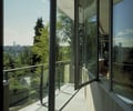 Preview of East Ford Residence - Image 5: Balcony, Window, Glass, Steel, Concrete, Tile, Wood, Flora.