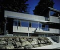 Preview of East Ford Residence - Image 9: Flora, Vase, House, Office Building, Stone, Steel, Window, Glass, Wood, Stair, Staircase, Balcony, Entry, Garage.