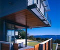 Preview of Eaton Residence - Image 0: Building, Housing, Courtyard, Water features, Structure steel, Structure wood, Concrete floor, Wood floor, Wood ceiling, Glass exterior, Glass interior, Exposed duct, Cantilever, Color, Waterfront, Outdoor.