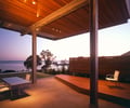 Preview of Eaton Residence - Image 15: Porch, Patio, Pergola, Dining Table, Furniture, Table, Building, Outdoor, Waterfront, Structure steel, Concrete floor, Wood floor, Cantilever, Lighting.