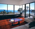 Preview of Eaton Residence - Image 3: Coffee Table, Furniture, Table, Building, Housing, Indoors, Couch, Chair, Indoor, Waterfront.
