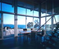 Preview of Eaton Residence - Image 4: Chair, Furniture, Dining Table, Table, Glass exterior, Indoor, Waterfront, Structure steel, Concrete floor.