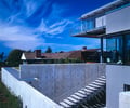 Preview of Eaton Residence - Image 8: Courtyard, Structure steel, Concrete wall, Water feature, Cantilever, Outdoor.