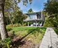 Preview of Ehab - Image 2: Path, Pavement, House, Housing, Outdoors, Yard, Cantilever, Steel, Wood, Stair, Patio, Flora, Glass exterior, Structure steel.