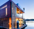 Preview of Floating Home - Image 0: Bridge, Building, Housing, Outdoor, Structure steel, Water front, Color, Glass exterior, Lighting, Wood ceiling.