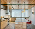 Preview of Floating Home - Image 14: Chair, Furniture, Indoors, Interior Design, Kitchen, Room, Wood floor, Wood ceiling.