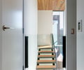 Preview of Floating Home - Image 19: White Board, Flooring, Apartment, Building, Housing, Indoors, Loft, Door, Interior Design, Wood ceiling, Stair, Wood floor.