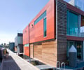 Preview of Floating Home - Image 6: Building, Office Building, Path, Pavement, Sidewalk, Walkway, Bucket, Apartment Building, City, High Rise, Town, Urban, Dock, Pier, Color, Exterior glass, Wood wall, Steel wall.