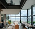 Preview of Graham Residence - Image 12: Great room, Sink, Dining Table, Furniture, Table, Chair, Dining Room, Indoors, Room, Apartment, Building, Housing, Banister, Handrail, Indoor, Exterior glass, Interior glass.