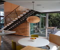 Preview of Graham Residence - Image 13: Dining Room, Indoors, Interior Design, Room, Dining Table, Furniture, Table, Porch, Stail, Wood wall, Indoor, Concrete floor, Courtyard, Lighting.