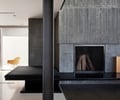 Preview of Graham Residence - Image 19: Fireplace, Hearth, Chair, Furniture, Concrete wall, Structure steel, Concrete floor, Indoor.