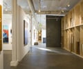 Preview of Grand Image - Image 1: Corridor, Floor, Flooring, Banister, Handrail, Staircase, gallery, display, concrete floor, structure wood, art, rolling door.