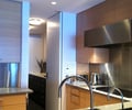 Preview of Hanna Condominium - Image 2: Furniture, Sideboard, Light Fixture, hood.