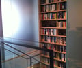 Preview of Hanna Condominium - Image 3: Bookcase, Furniture, books, glass rail, Glass interior.