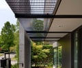 Preview of Highland Residence - Image 15: Flora, Jar, Plant, Potted Plant, Pottery, Vase, Patio, Pergola, Porch, Canopy, grating , paver , Concrete wall, Structure steel.