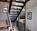 Preview of Highland Residence - Image 4: Banister, Handrail, Staircase, Glass interior.