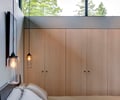 Preview of Highland Residence - Image 7: Bed, Furniture, Window, Flora, Jar, Plant, Potted Plant, Pottery, Vase, Balcony, Indoors, Interior Design, Door, Sliding Door, Bedroom, Room, Lighting.