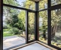 Preview of Vashon Island Cabin - Image 22: window seat, large windows, black steel, indoor-outdoor living, natural light, wood ceiling, modern, contemporary, deck, minimalist, garden view, hardwood floor, custom furniture, nature, urban, architectural design, relaxation space..