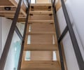 Preview of Lagerberg Mooring - Image 14: stair, structure wood, railing, wood, metal, modern design, open risers, interior, minimalist architecture.
