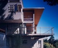 Preview of Leschi Residence - Image 10: Balcony, Building, Cottage, House, Housing, Awning, Canopy, Office Building, Flora, Ivy, Plant, Siding, cantilever , guardrail .