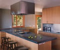 Preview of Leschi Residence - Image 18: Dining Table, Furniture, Table, Appliance, Electrical Device, Oven, Bar Stool, Indoors, Interior Design, Kitchen, Room, Dining Room, Apartment, Building, Housing.