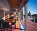 Preview of Leschi Residence - Image 9: Dining Table, Furniture, Table, Porch, Chair, Building, House, Housing, Villa, Apartment, Indoors.