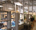 Preview of Light Manufacturing - Image 1: Exposed Structure, Structure Steel, Exposed Duct, Office, Concrete, Lighting Fixture, Desk.