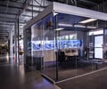 Preview of Light Manufacturing - Image 9: Airport Terminal, Dining Table, Indoors, Steel, Concrete, Carpet, Meeting Room, Conference Room, Glass, Structure Steel, Exposed Structure, Exposed Duct, Graffiti, Chainmail, Curtain, Fish Tank.