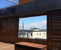 Preview of Madison Park Courtyard Spaces - Image 7: sun screen, fire pit, ipe, corten.