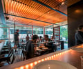 Preview of Mamnoon Street - Image 2: People, Oven, Restaurant, Exercise, Sports, Steel, Wood, Glass, WIndow, Door, Concrete, Dining Table.