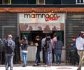 Preview of Mamnoon Street - Image 8: Window, Steel, Steel Grate, Wood, Concrete, Street, Storefront, Dining Table, Restaurant.
