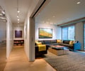 Preview of Market Condo - Image 11: Couch, Furniture, Indoors, Interior Design, wood floor, door, pocket door, bookcase, steel furniture, Sitting Room, Living Room, Wood, Stainless Steel, Sliding Partition, Glass, Window, Hall, Condominium.