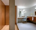 Preview of Market Condo - Image 12: Indoors, Interior Design, Furniture, Wood, bathroom, wood floor, lighting, vanity light, wood cabinet, wood door, pivot hinge, tile , structure concrete, Concrete, Pillar, Bathroom, Tile, Condominium.