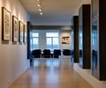 Preview of Market Condo - Image 8: Indoors, wood floor, lighting, wall base, steel furniture, art cabinet, Interior Design, Furniture, Steel , Wood, Concrete, Hall, Condominium.