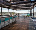 Preview of Mbar - Image 0: Deck, Chair, Concrete, Wood, Steel, Structure Steel, Pergola, Dining Table, Bar, Rooftop, Outdoor.