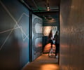 Preview of Mbar - Image 5: Female, Person, Tunnel, Hall, Concrete, Wood, Steel, Entry, Restaurant.