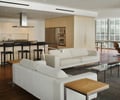 Preview of Millennium Tower Condo - Image 8: Couch, Furniture, Chair, living room, bar seating, kitchen.