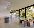 Preview of Open House - Image 0: Great room, Dining Table, Furniture, Table, Dining Room, Indoors, Room, Bench, kitchen, indoor outdoor, concrete, bar stools, steel, structure steel, glass exterior , garage door.
