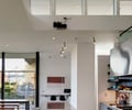 Preview of Open House - Image 10: Appliance, Electrical Device, Oven, Indoors, Interior Design, Furniture, Table, Dining Room, Room, Dining Table, kitchen, stainless steel, countertop, hood, concrete floor, lighting, clerestory, faucet.
