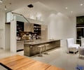Preview of Open House - Image 11: Indoors, Interior Design, Hardwood, Wood, Stained Wood, Furniture, Dining Room, Room, wood table, bar stools, kitchen, glass guardrail, recessed base, hood.